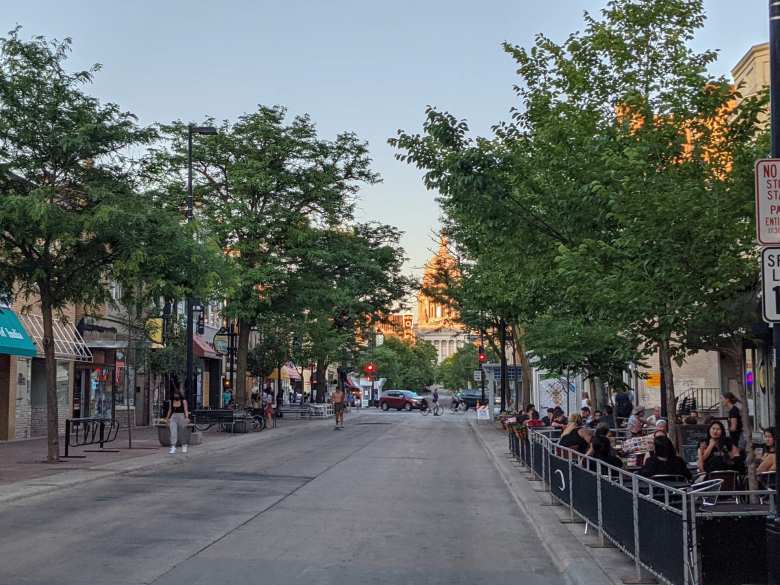 Dining on State Street in Madison, Wisconsin with the capitol in the background.