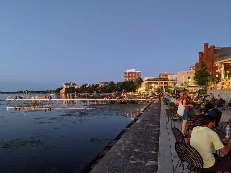 Lots of people were socializing outside Memorial Union Terrace at the University of Wisconsin.