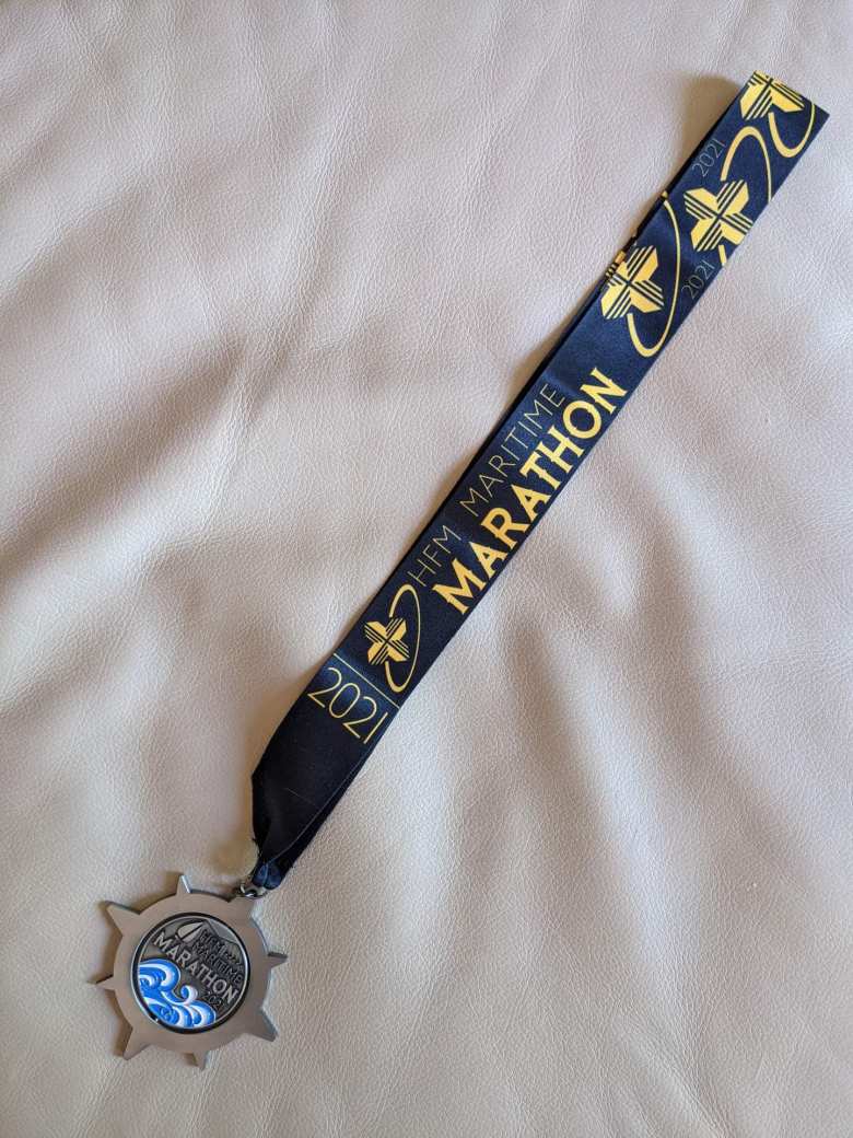 The finisher's medal for the 2021 Maritime Marathon.