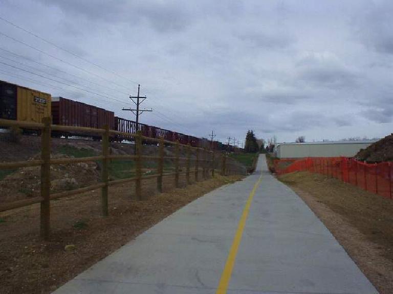 The trail is adjacent to the Burlington Northern Santa Fe Railroad.
