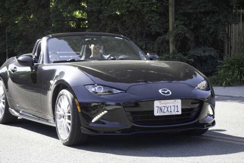 Taking my nephew for a ride in the Miata. It was his first time in a sports car, a convertible, and a car with a manual transmission.