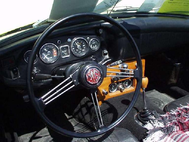Goldie's interior, featuring the custom wooden center console in which I installed Smiths gauges in January 1997.
