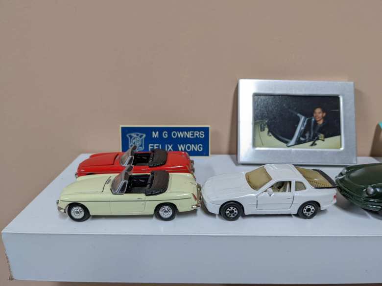 Scale models of my former red 1974 MGB, yellow 1969 MGB, and white 1986 Porsche 944 Turbo.