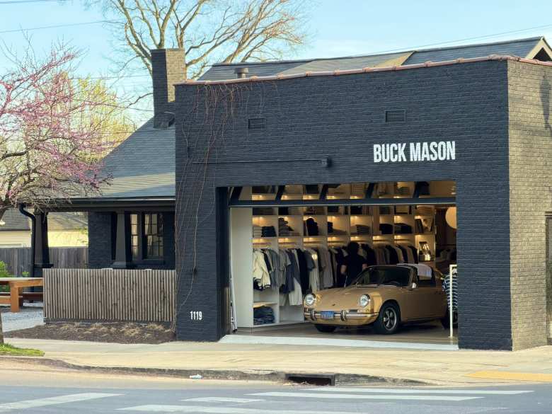 A vintage Porsche 911 is inside the Buck Mason clothing store in the 12 South neighborhood of Nashville.