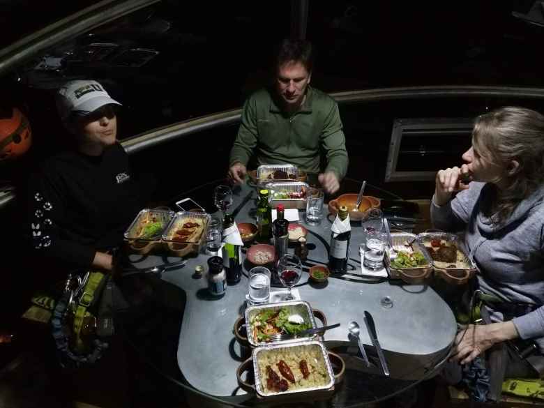 Mel, Matthew, and Teresa having a delicious dinner of salad and quinoa made by the Natura Vive guides.