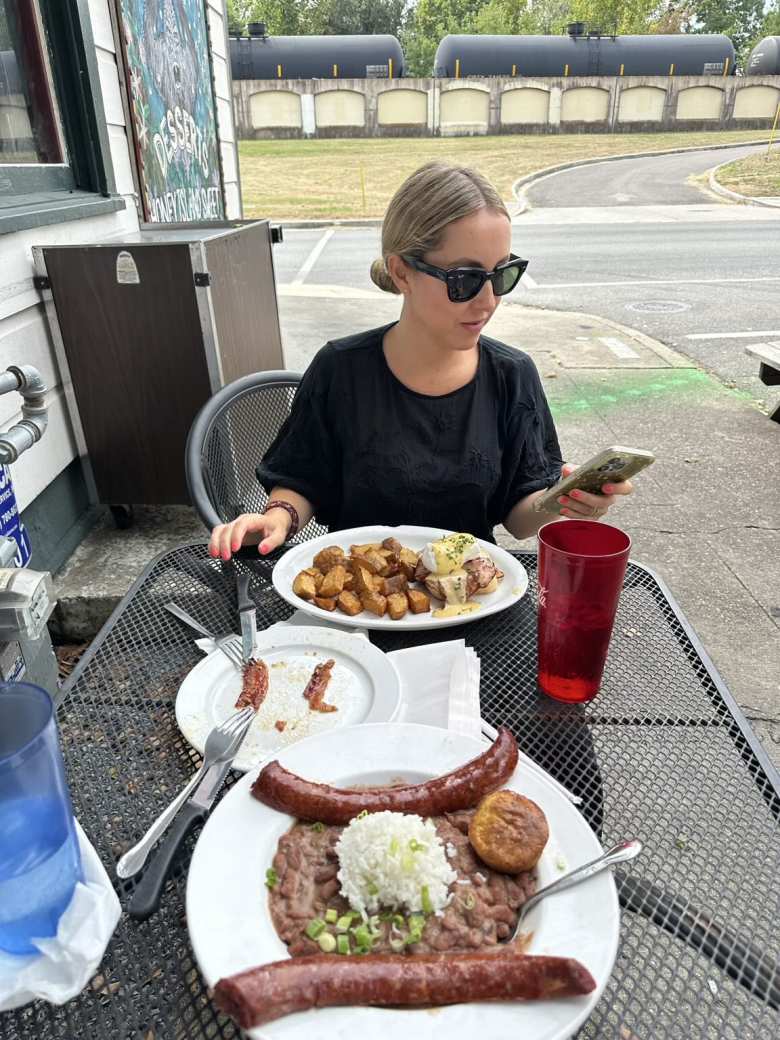 At Elizabeth’s Restaurant, we had a brunch consisting of of potatoes, eggs, praline bacon, baked beans, cornbread, rice, and sausage.