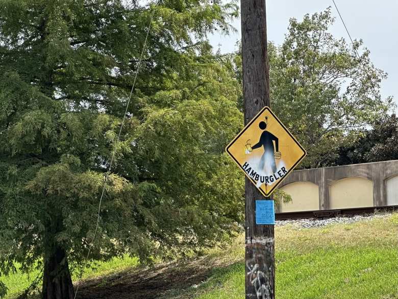 I don’t condone vandalism or graffiti, but this one of “Hamburgler” at least was funny. 