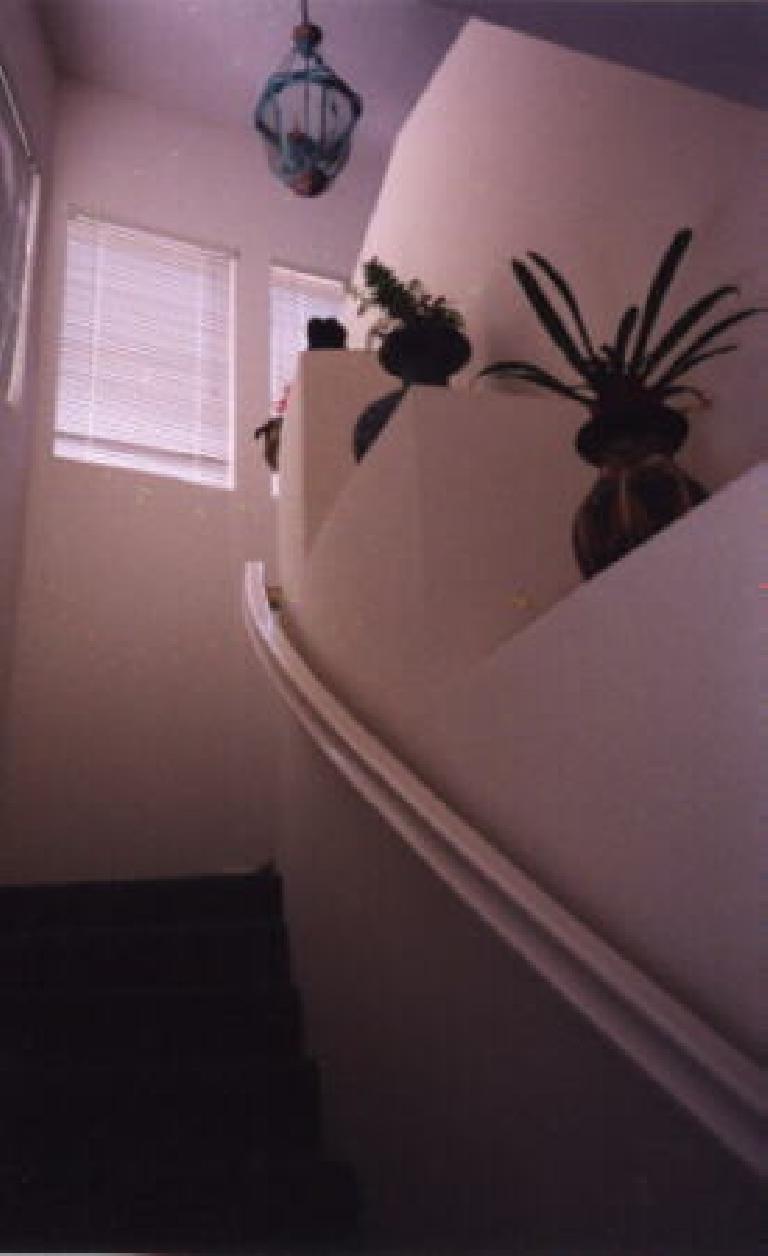 Perhaps the most beautiful feature is the curving stairway leading from the foyer.