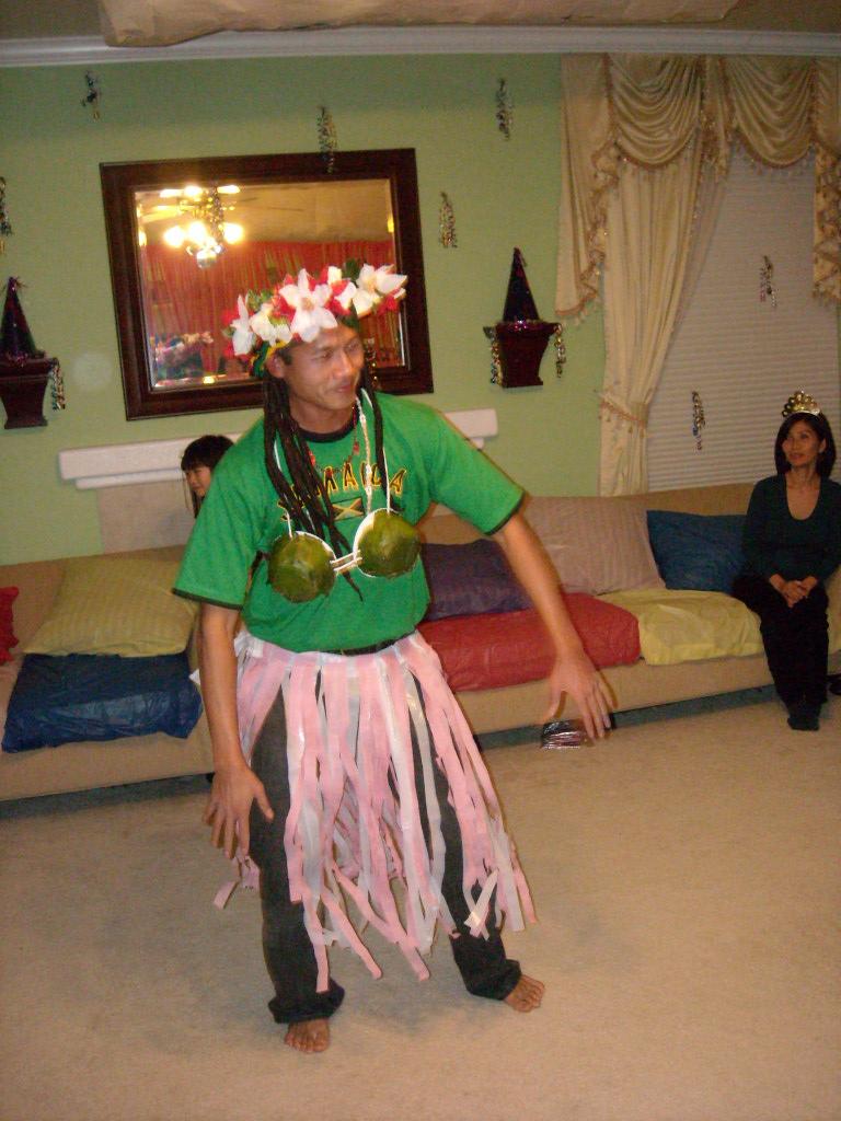 Thavrin begins his hula dance.