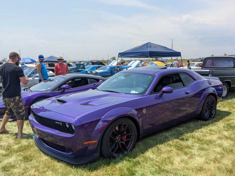 A plum crazy purple Dodge Challenger Hellcat.