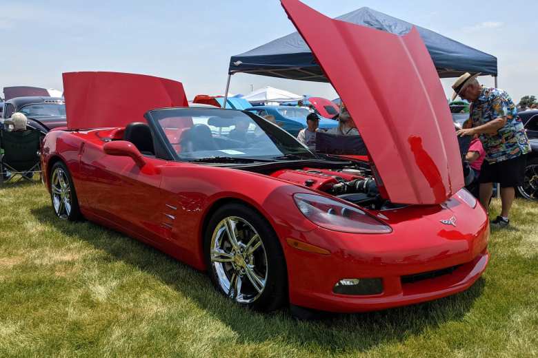 A red C6 Corvette convertible.