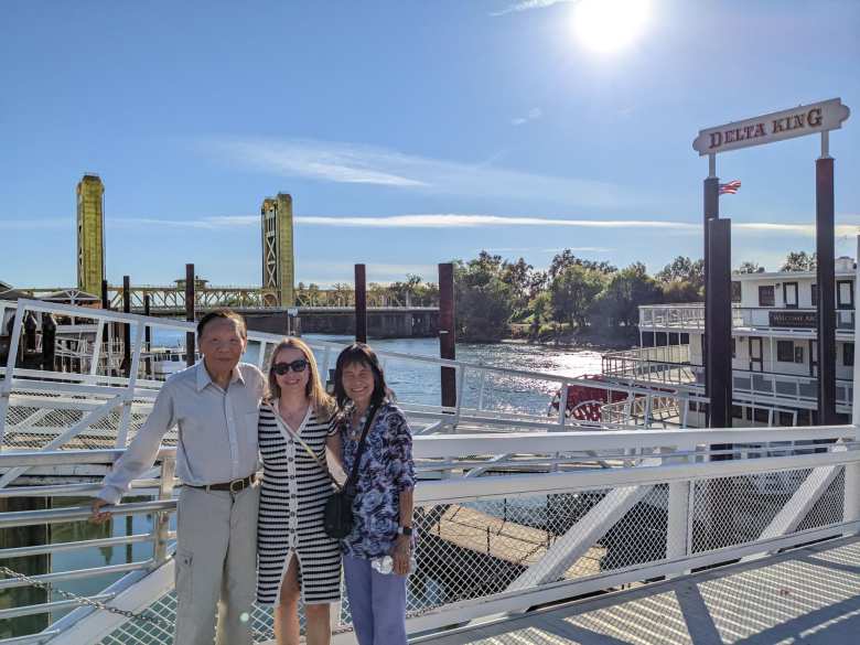 My dad, Andrea, and my mom in front of the Delta King riverboat in Old Sacramento.