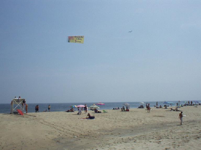 Amazingly, the beach at Sandy Hook was filled with... more commercialism.  Many planes would fly on by with banners advertising stuff to the sunbathers.
