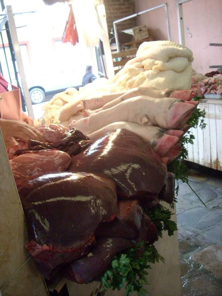 This market had vendors selling huge slabs of bull liver, hooves, and tribe (intestines).