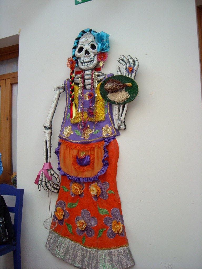Skeleton art on the wall of the dining room in La Casa de Sabores.