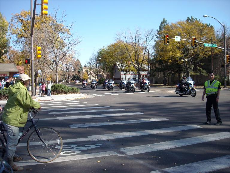 I was biking over to CSU but encountered a police blockade here at Mulberry St.  This is because the Obama motorcade was coming through.