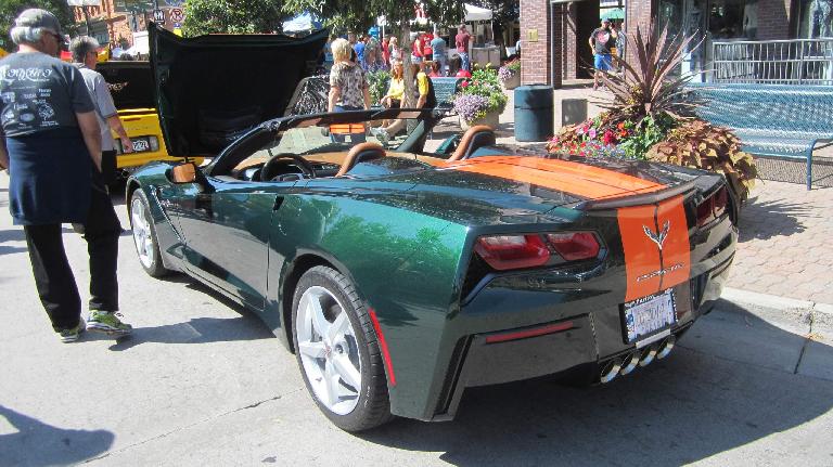 Green C7 Corvette convertible with orange stripes. This was Maureen's favorite.