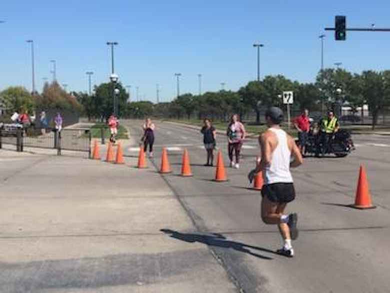 Felix Wong coming into the finish of the 2019 Omaha Marathon.