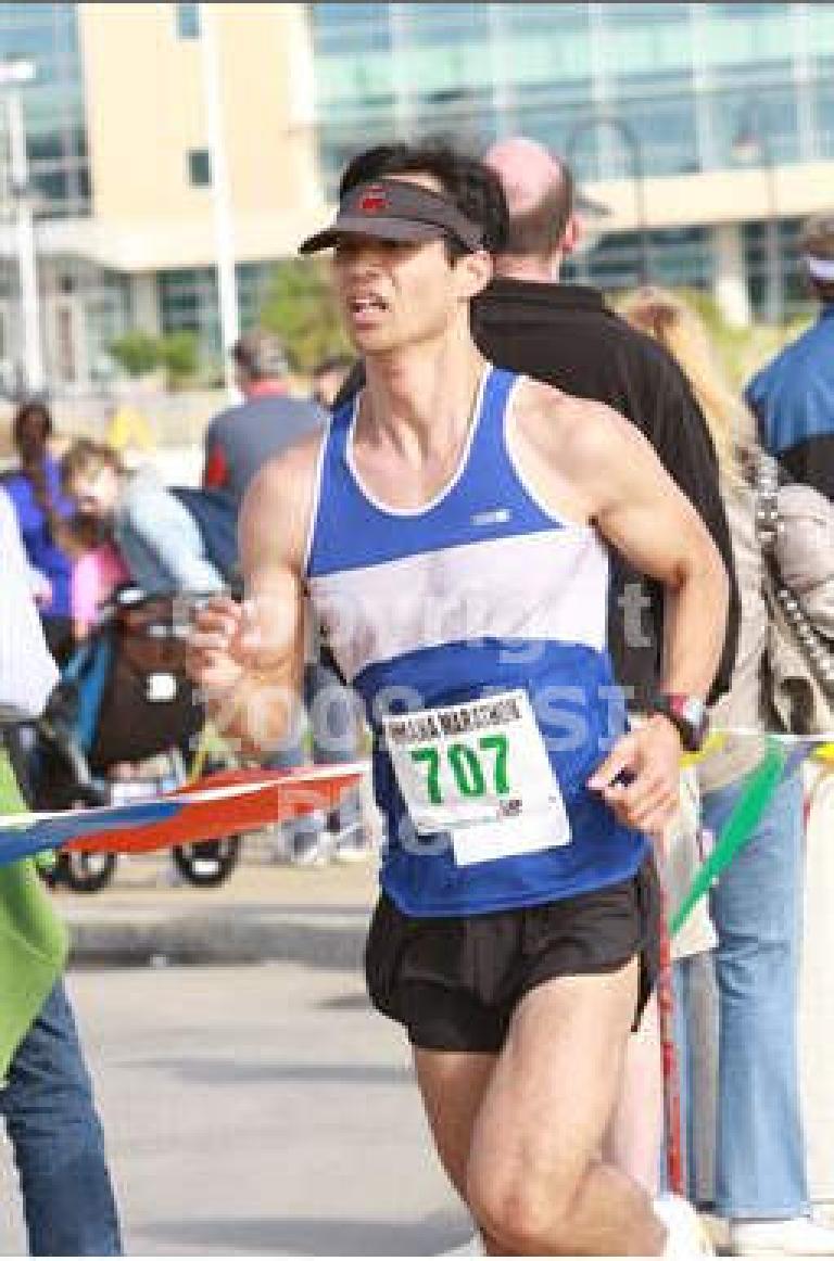 Felix Wong running near the end of the 2010 Omaha Marathon. Photo: ASI Photo. Felix Wong running in the 2010 Omaha Marathon