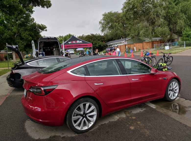 Two Tesla Model 3s---one red and the other one black---were on hand at Open Streets, courtesy of members of Drive Electric Northern Colorado.