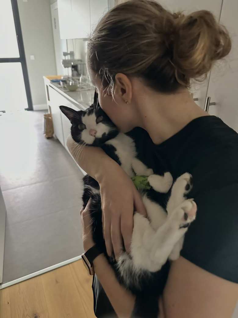 Andrea gives Oreo a kiss while he wears a bandage after a blood draw at the vet. Andrea gives Oreo a kiss while he wears a bandage after a blood draw at the vet.