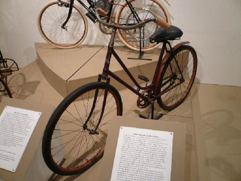 The 1898 Nichols Ladies Safety bicycle allowed women to easily mount while wearing ankle-length dresses.