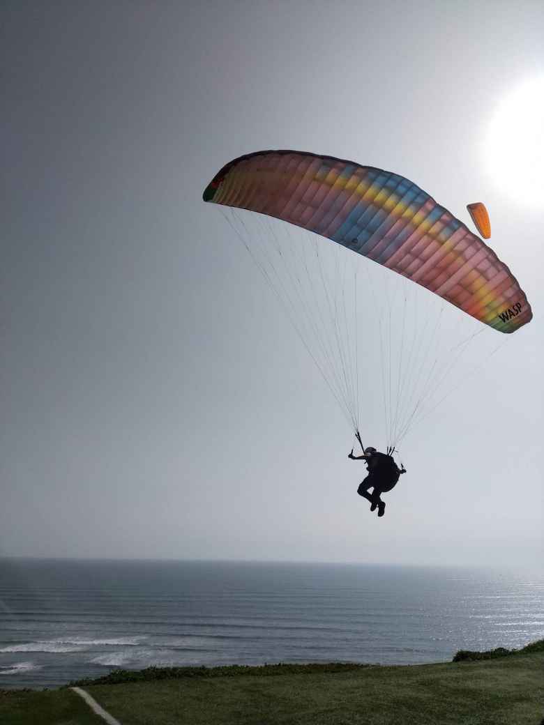 Matthew launching his paraglider in Lima, Peru.