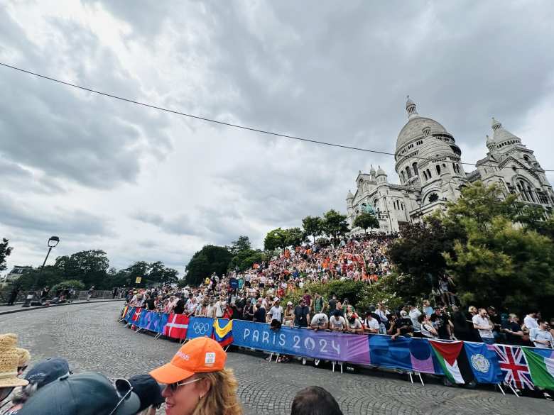 Spectators were ready for the Olympic cyclists to pass by the Basilica of the Sacré-Cœur at Montmartre three times.