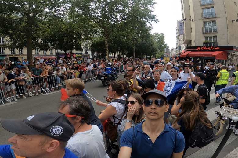 I found a good place to watch the Olympic men's cycling road race one block east of the Moulin Rouge.