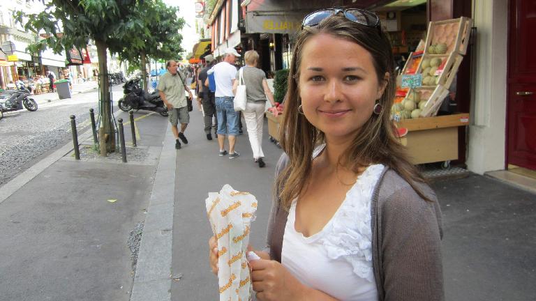 Katia with a sandwich in Montmartre.