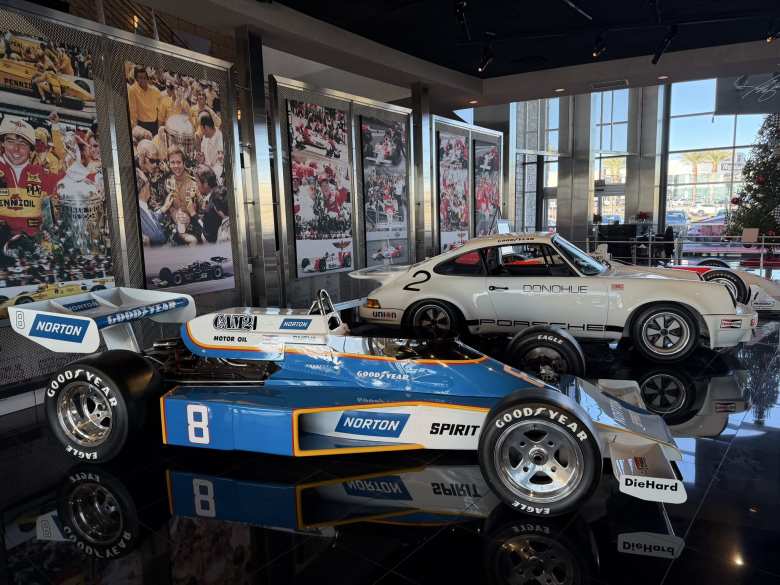 A 1977 Penske PC-5 driven by Tom Sneva with a 1973 IROC Porsche RSR.
