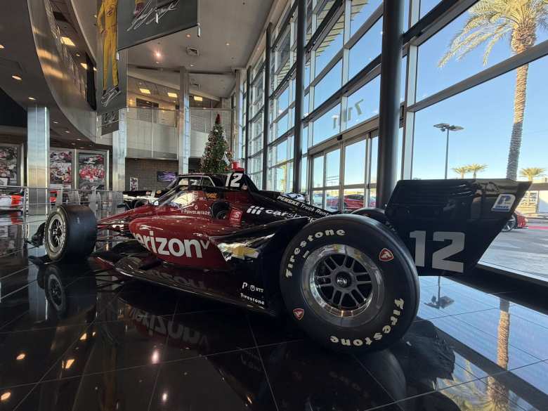 A 1977 Penske PC-5 driven by Tom Sneva with a 1973 IROC Porsche RSR.