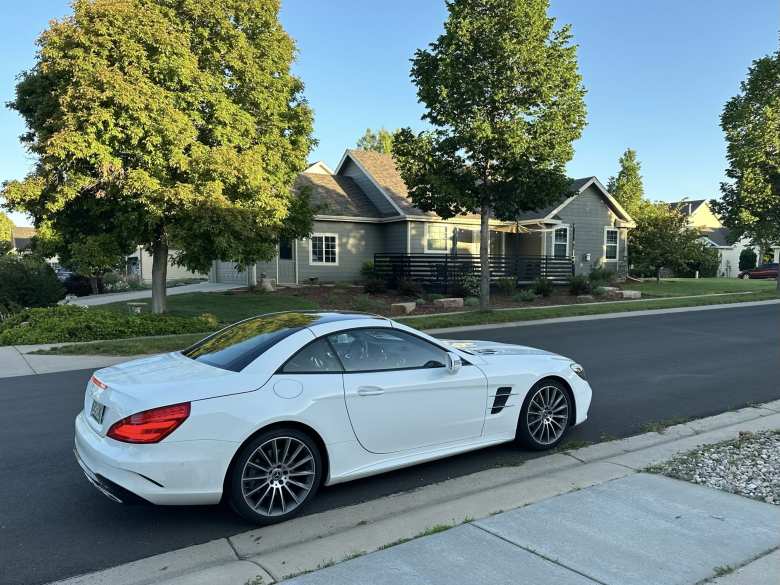 JZ drove us over in his white Mercedes-Benz SL550.