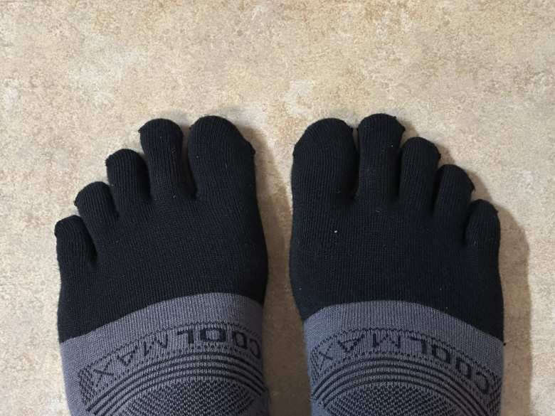 I used toe socks for the first time in a race to try to avoid getting blackened toe nails and blisters between the toes.