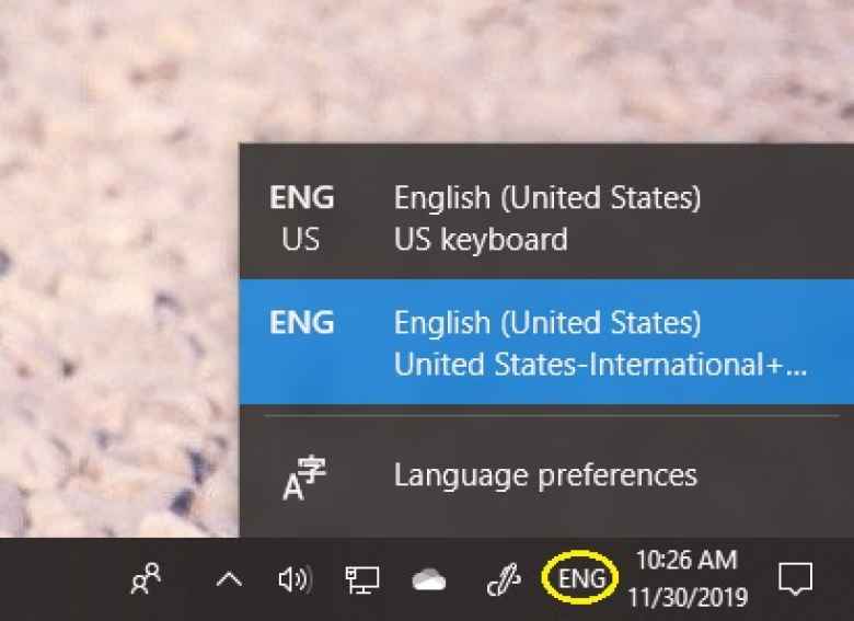 The United States-International+Pinyin keyboard in the Windows 10 system tray.