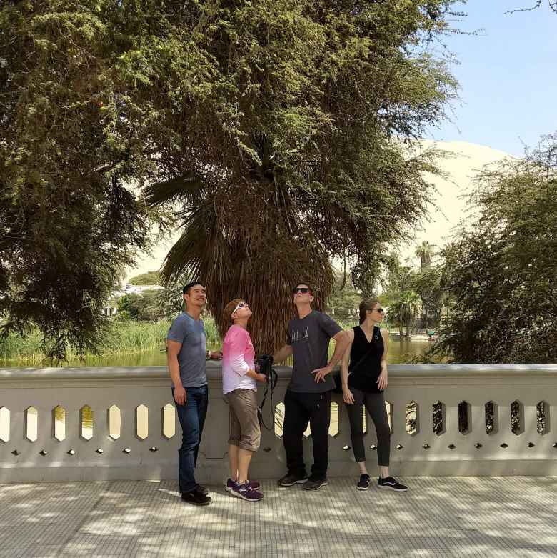 Felix, Mel, Matthew, and Teresa at the Huacachina Lagoon in Ica, Peru.