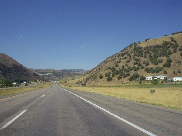 The forest land 50 miles to the east of Pocatello gave way to barren foothills upon the approach to the town.