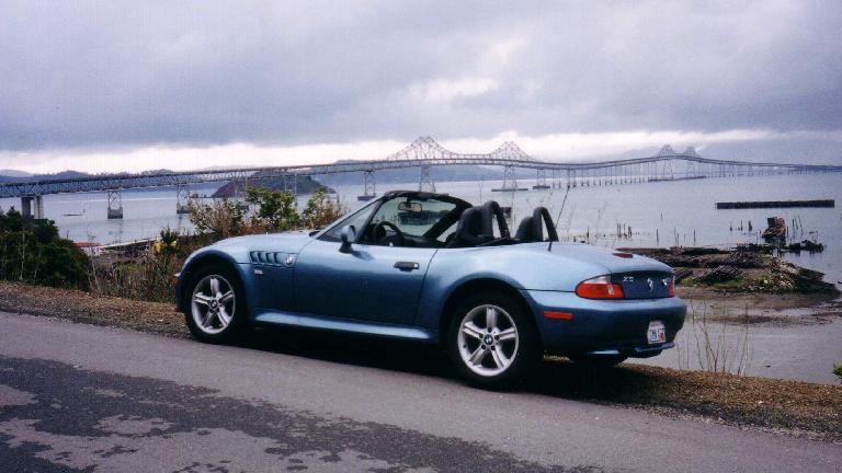 On the way to Point Reyes, Lina takes a picture break with the Richmond Bridge in the background.