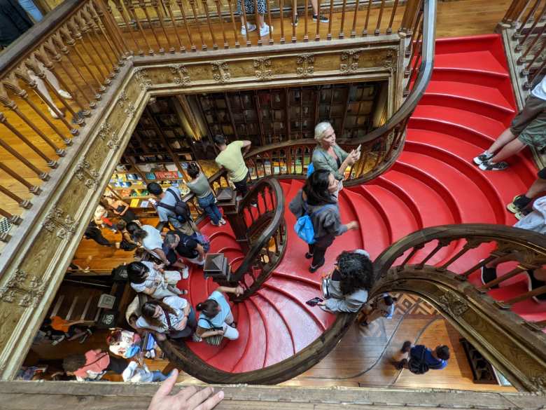 The red, curving staircase of the Lello Bookstore.