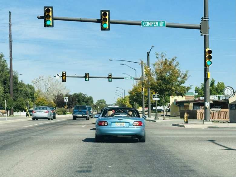 I encountered Manuel in his Crystal Blue Metallic Mazda Miata on College Avenue in Fort Collins.