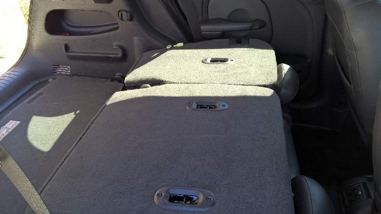 The PT Cruiser's rear seats folded down.
