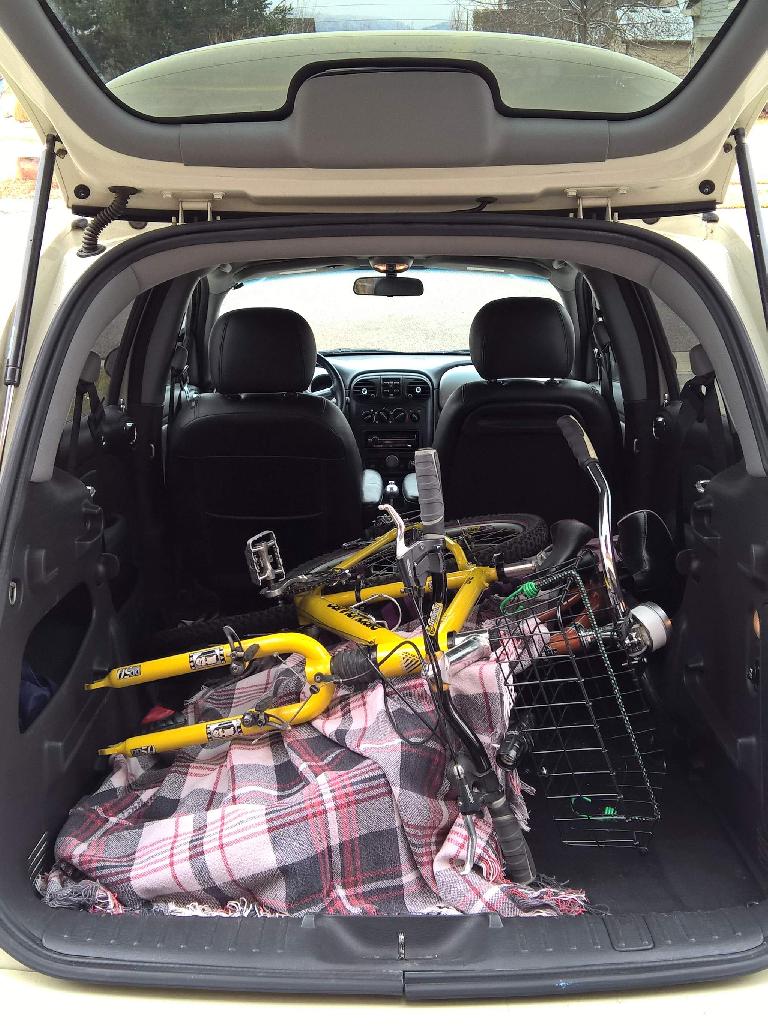 A mountain bike a cruiser bike also fit pretty readily in the PT Cruiser with the rear seats removed.