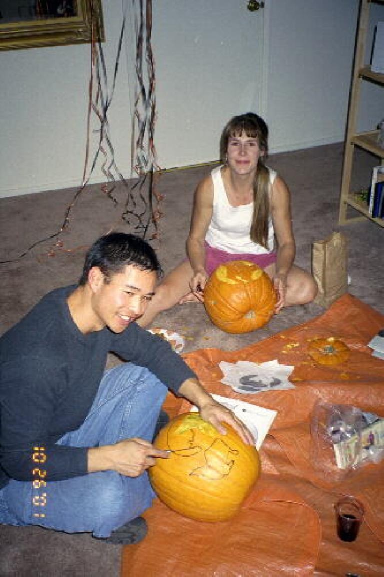 Felix Wong and Sharon working away at their pumpkins.