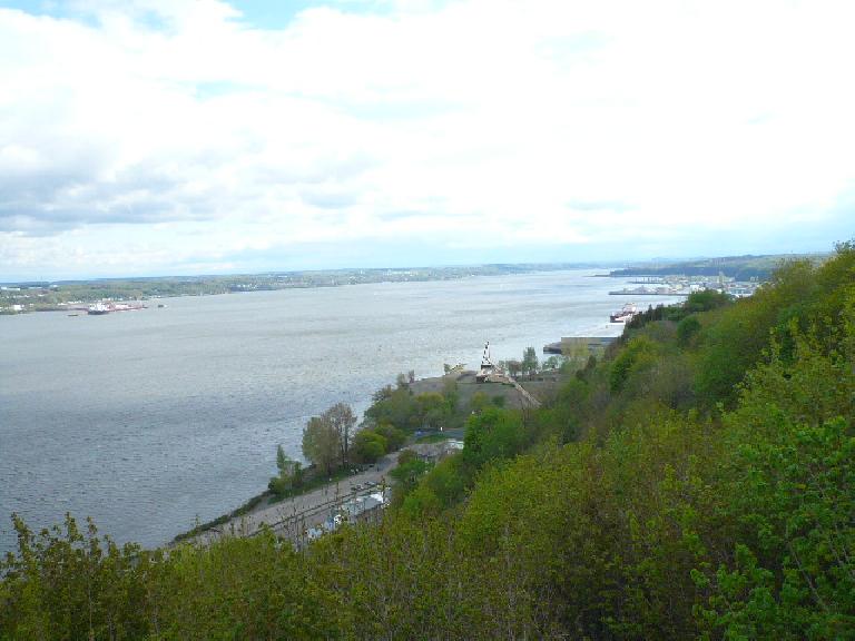 view of the Saint Lawrence River as viewed from a treed hillside