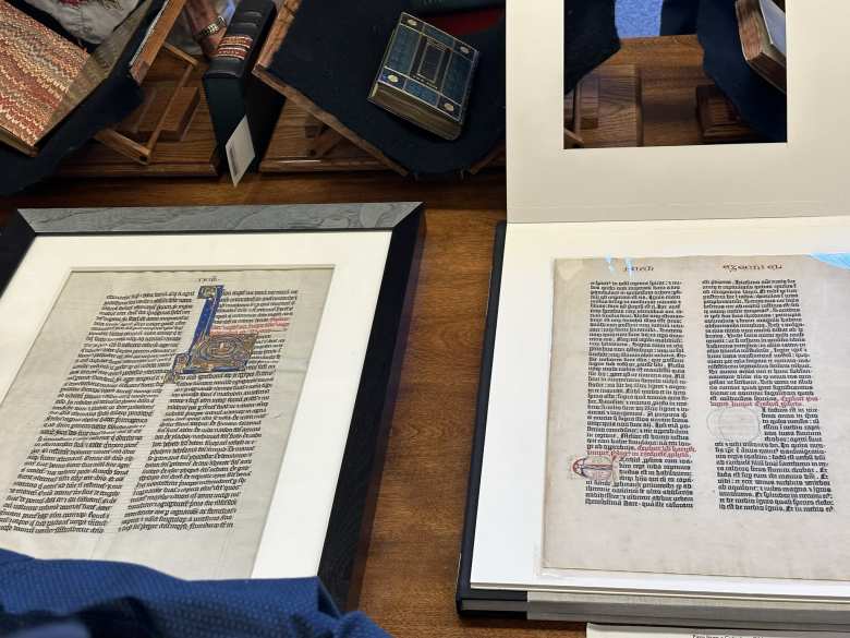 This leaf of the Gutenberg bible (right, cerca 1455) was printed based off the hand-drawn bible on the left. There were no page numbers, table of contents, or indexes. Red dots were hand-drawn at the beginning and end of chapters.