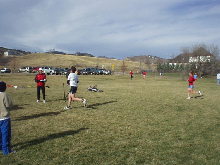 X-country runners coming into the finishing chute at the Rattlesnake Rumble in Fort Collins.