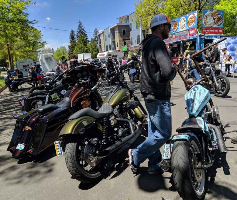 I liked the green custom Harley-Davidson cruiser in the center. The bike to the right of it with a turquoise trapezoidal fuel tank was interesting too.