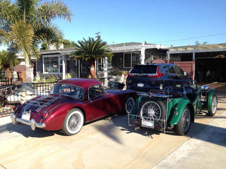 Dan Shockey's red MGA coupe and green 1935 MG P-type roadster..