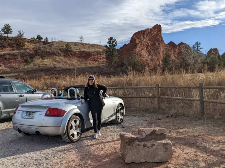 Andrea standing next to my silver Audi TT Roadster Quattro at Red Rock Canyon in Colorado Springs.