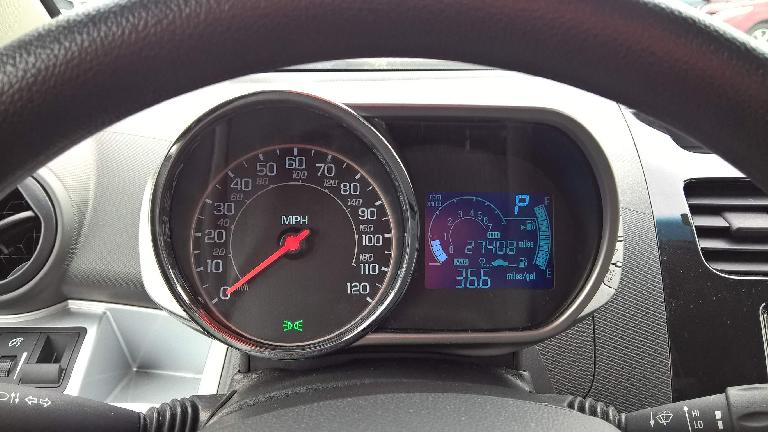 Motorcycle-inspired gauge pod inside a 2015 Chevrolet Spark.